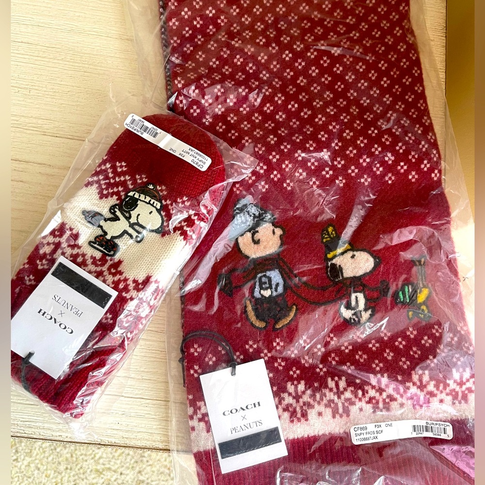 Scarf and mittens by Coach with Peanuts cartoon characters.